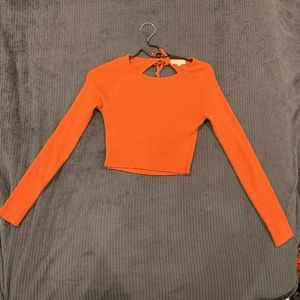 Cropped orange sweater